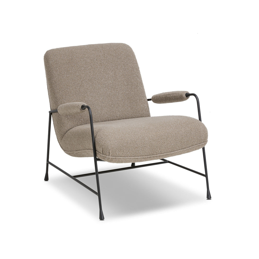 Beige armchair with black metal frame on a white background